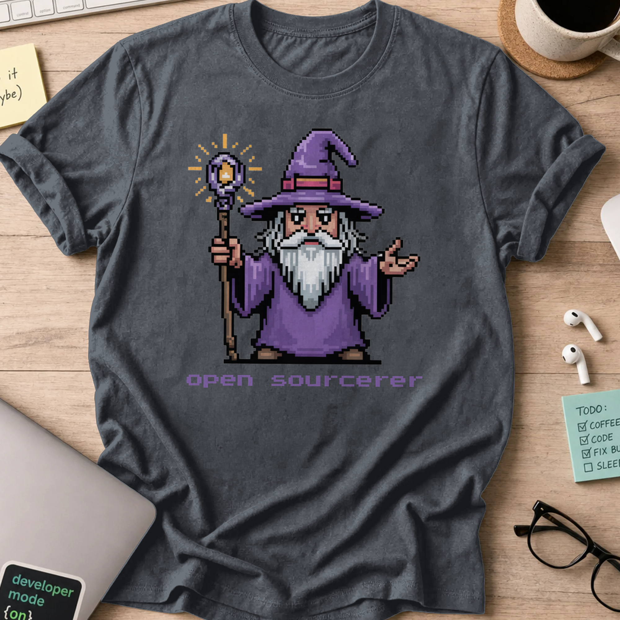 Dark Heather programmer shirt printed with "open sourcerer", a funny developer t-shirt and coding gift for software engineers and coders.