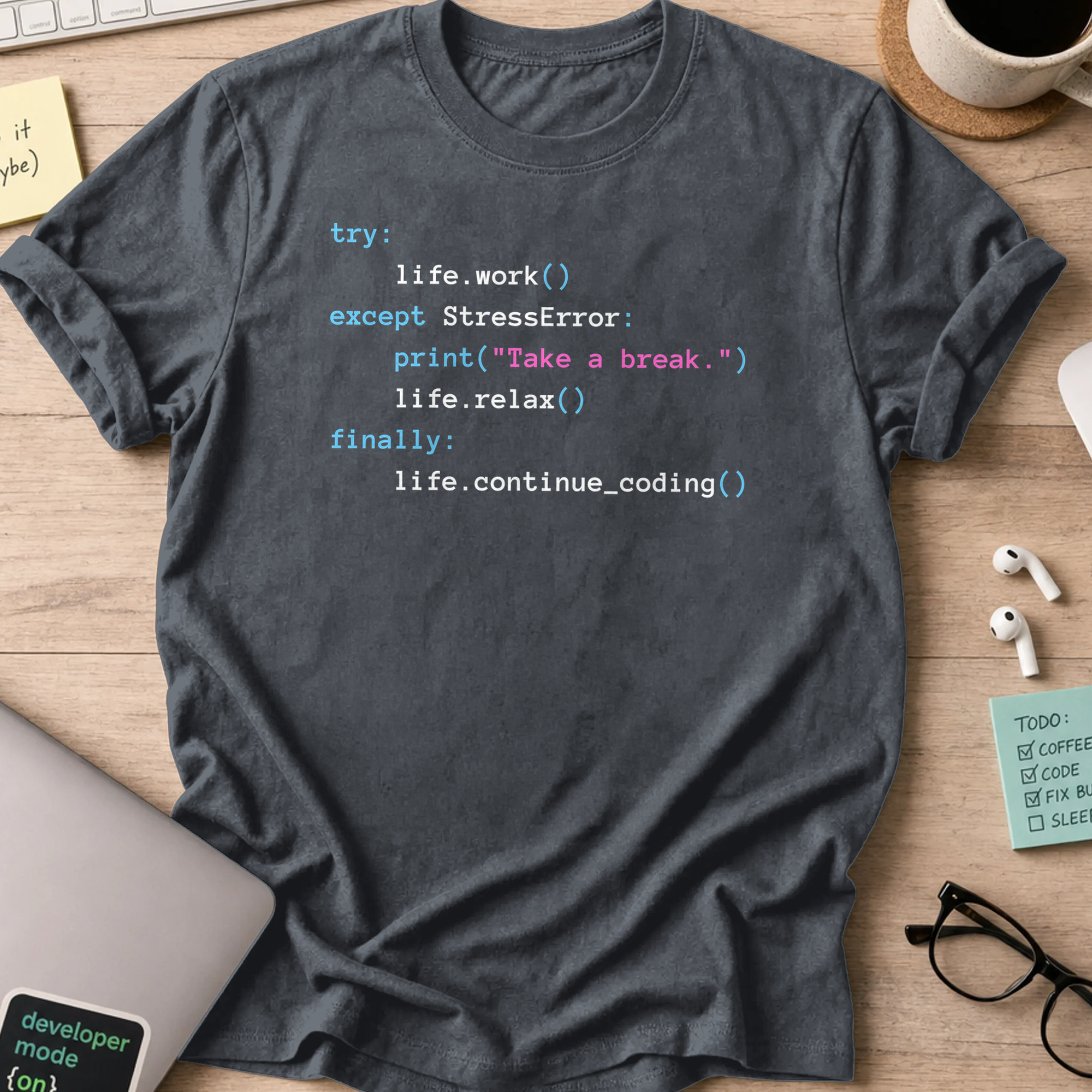 Dark Heather Grey programmer shirt printed with "print(take a break)", a funny developer t-shirt and coding gift for software engineers and coders.