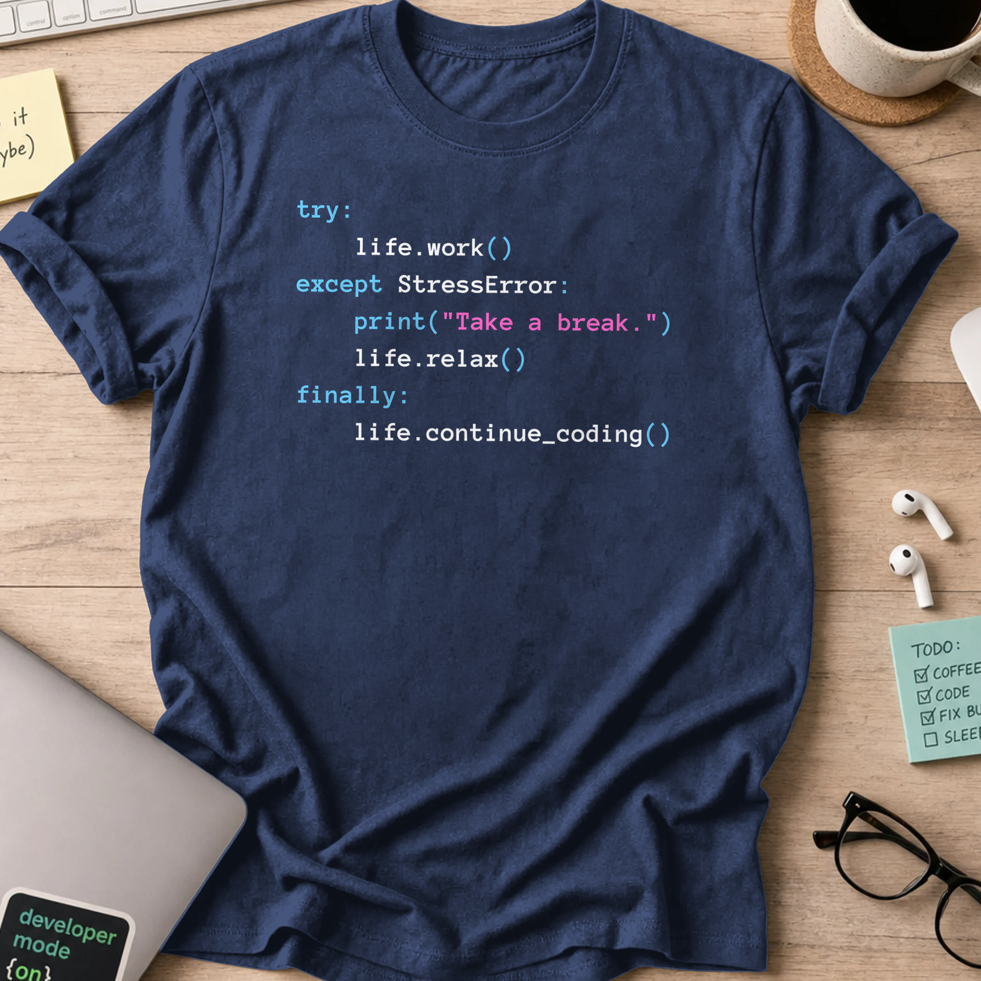 Navy programmer shirt printed with "print(take a break)", a funny developer t-shirt and coding gift for software engineers and coders.