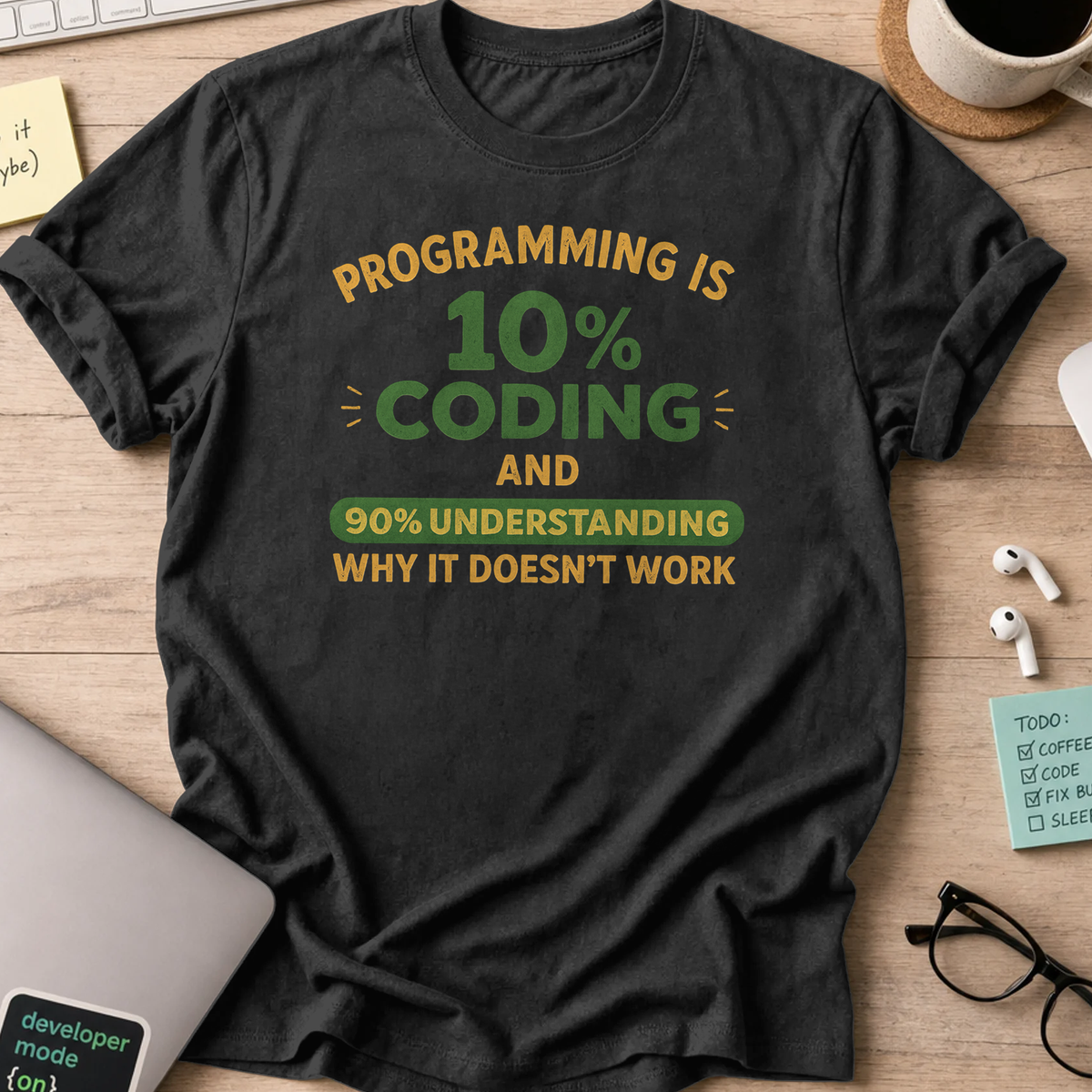 Black programmer shirt printed with "programming is 10% coding", a funny developer t-shirt and coding gift for software engineers and coders.