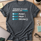 Dark Heather Grey programmer shirt printed with "pushing to main branch on friday", a funny developer t-shirt and coding gift for software engineers.