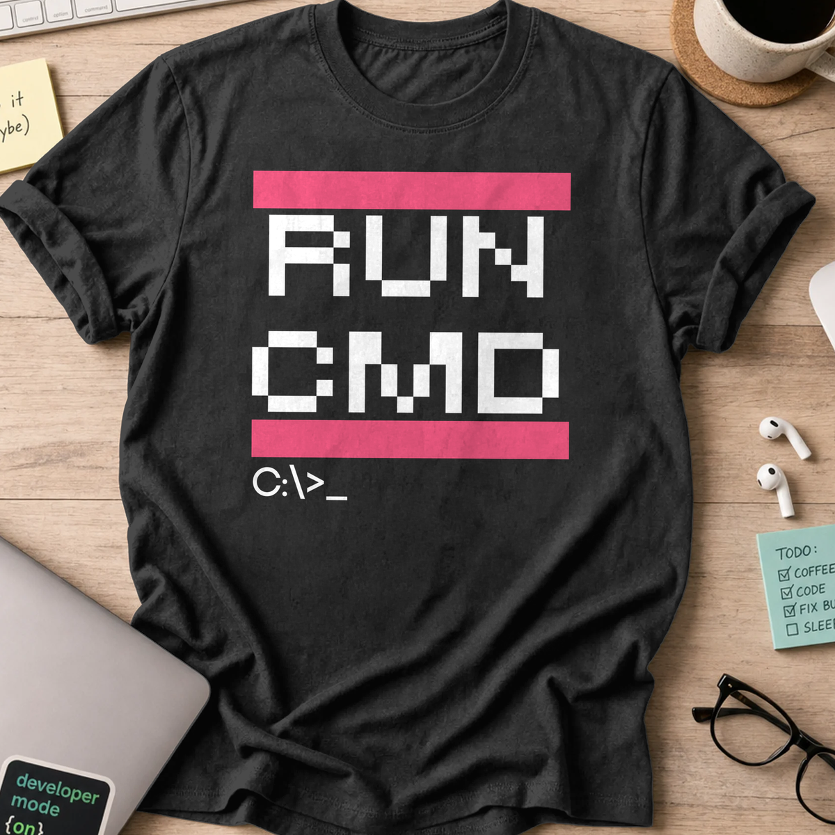Black programmer shirt printed with "RUN CMD", a funny developer t-shirt and coding gift for software engineers and coders.