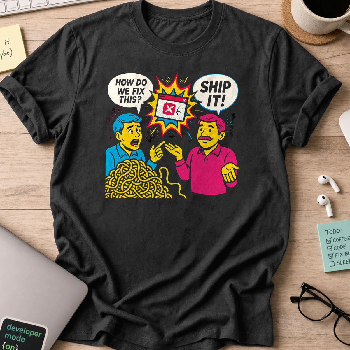 Black programmer shirt printed with "spaghetti code ship it", a funny developer t-shirt and coding gift for software engineers and coders.