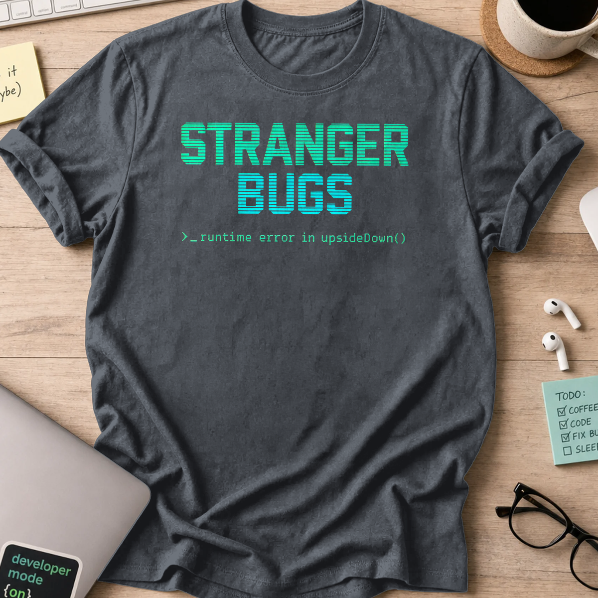 Dark Heather Grey programmer shirt printed with "stranger bugs", a funny developer t-shirt and coding gift for software engineers and coders.