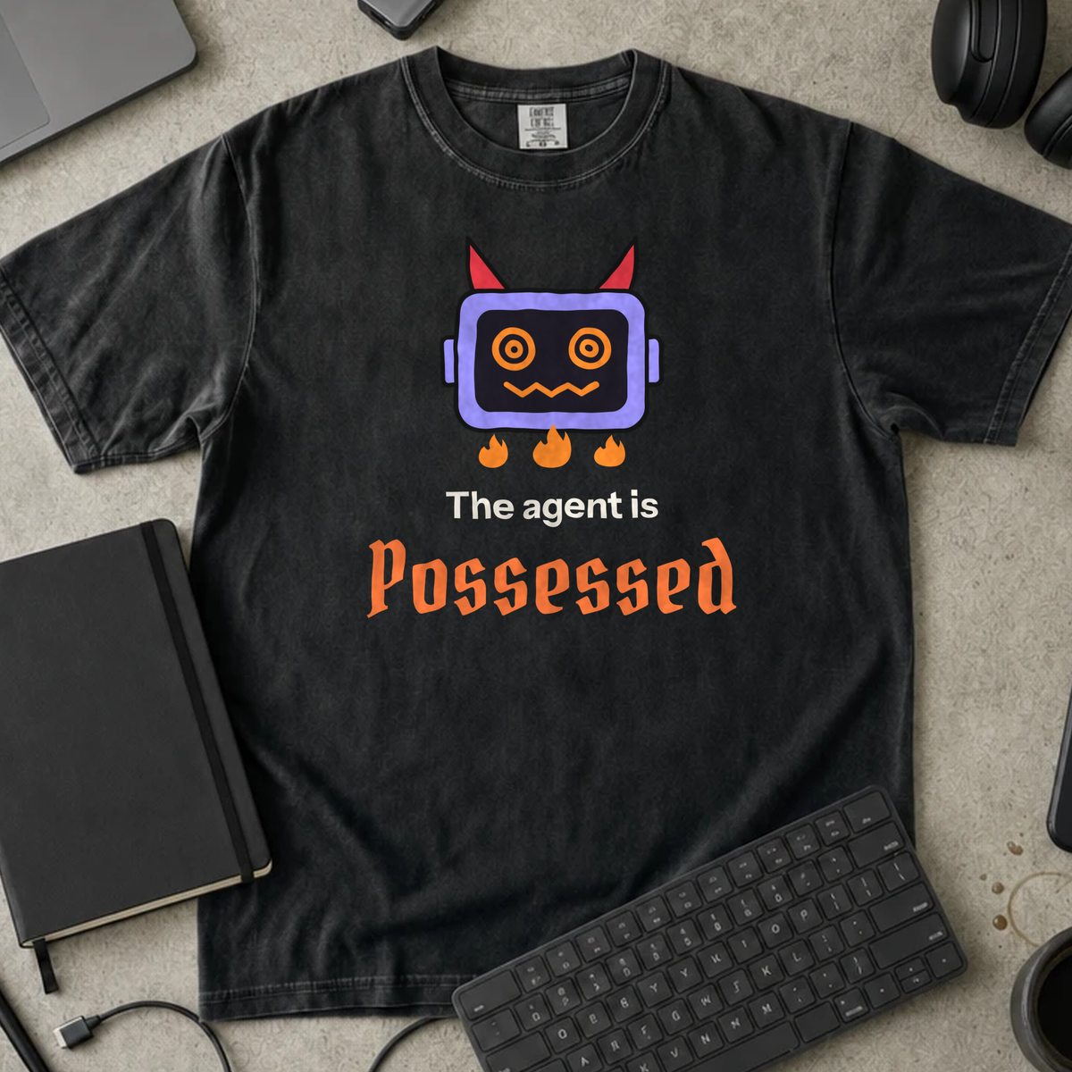The Agent Is Possessed Shirt — Black Comfort Colors 1717 flat lay