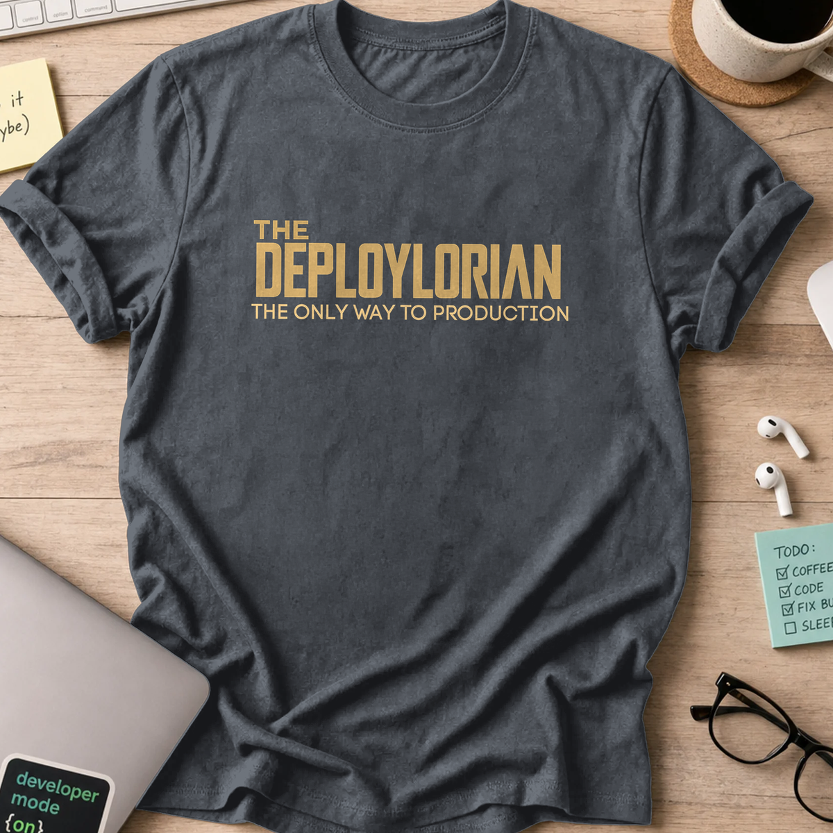 Dark Heather Grey devops shirt printed with "the deploylorian", a funny programmer t-shirt and coding gift for software engineers and DevOps teams.