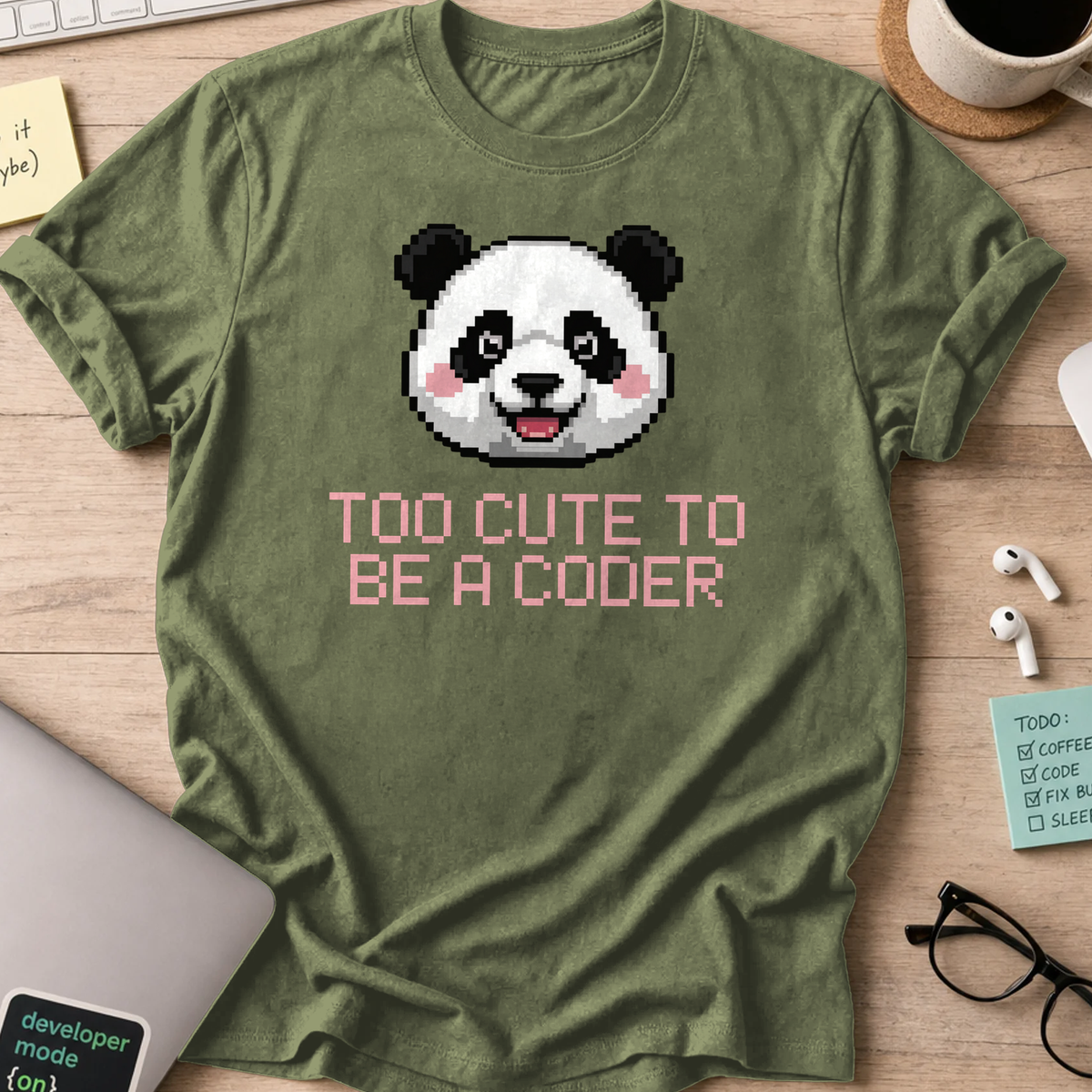Military Green programmer shirt printed with "too cute to be a coder", a funny developer t-shirt and coding gift for software engineers and coders.